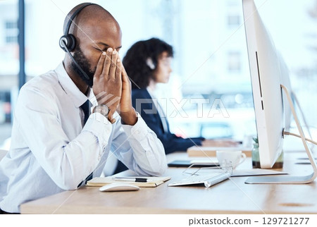 Business, black man and stress in call center, headache and depression with telemarketing, burnout and tired. Corporate, African American male agent or consultant with computer, overworked or anxiety 129721277