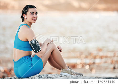 Arm band, young woman and fitness outdoor, for workout and exercise for wellness and health. Portrait, female athlete and girl with equipment for training, relax and practice for calm and mockup. Arm band, young woman and fitness outdoor, for workout and exercise for wellness and health. Portrait, female athlete and girl with equipment for training, relax and practice for calm and mockup. 129721310