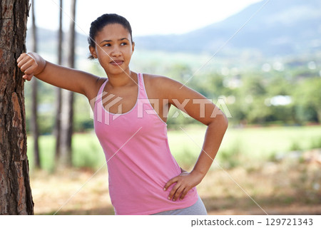 Fitness, black woman and runner rest at tree after cardio exercise, training and workout, garden and park. Female athlete thinking on a break from running in nature, healthy lifestyle and wellness Fitness, black woman and runner rest at tree after cardio exercise, training and workout, garden and park. Female athlete thinking on a break from running in nature, healthy lifestyle and wellness 129721343