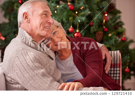 Christmas, love and senior couple hug on sofa in home, affection and bonding. Romance, xmas holiday and happy elderly, retired woman and man embrace on couch enjoying quality time together in house Christmas, love and senior couple hug on sofa in home, affection and bonding. Romance, xmas holiday and happy elderly, retired woman and man embrace on couch enjoying quality time together in house 129721410
