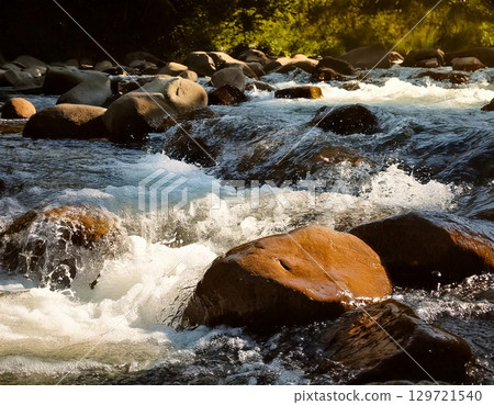 A river full of rocks 129721540