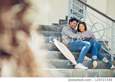 Couple, happy and skateboard while sitting on stairs with hug, love and romance in city sunshine. Black couple, urban happiness and outdoor with skater, embrace and romance on steps in San Francisco Couple, happy and skateboard while sitting on stairs with hug, love and romance in city sunshine. Black couple, urban happiness and outdoor with skater, embrace and romance on steps in San Francisco 129721598
