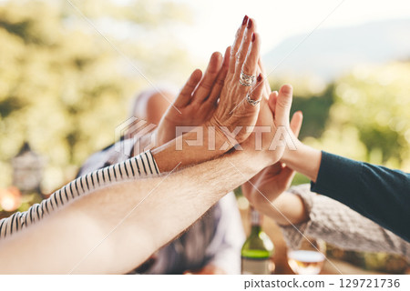 Support, high five and community with hands of family at dinner table for celebration, happy and lunch together. Collaboration, faith and festive with friends relax for solidarity, unity and pride 129721736