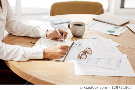 Budget, planning and woman writing in notebook at table with finance or tax documents. Savings, mortgage or financial investment, businesswoman working on payment plan for home accounting and fintech 129721863