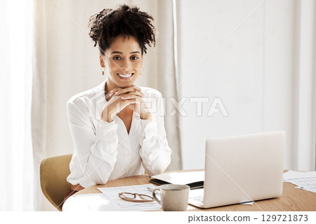 Portrait, laptop and black woman with smile, for startup company and happiness at desk in office. African American girl, female entrepreneur and browse internet for online reading, happy or confident Portrait, laptop and black woman with smile, for startup company and happiness at desk in office. African American girl, female entrepreneur and browse internet for online reading, happy or confident 129721873