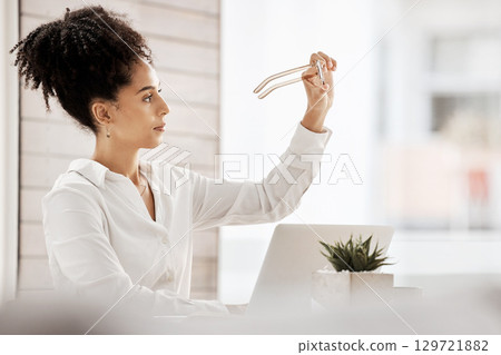 Business, black woman and glasses for reading on laptop in a clean office with vision, focus and eye care. Female entrepreneur at desk with fashion eyeglasses while thinking of innovation strategy 129721882