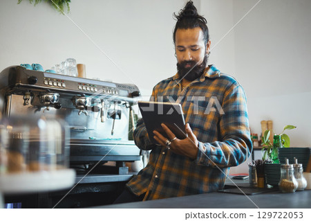 Tablet, barista man and cafe employee working on digital retail media design for business. Coffee shop waiter, ecommerce and person planning a restaurant web page for online shopping and networking Tablet, barista man and cafe employee working on digital retail media design for business. Coffee shop waiter, ecommerce and person planning a restaurant web page for online shopping and networking 129722053
