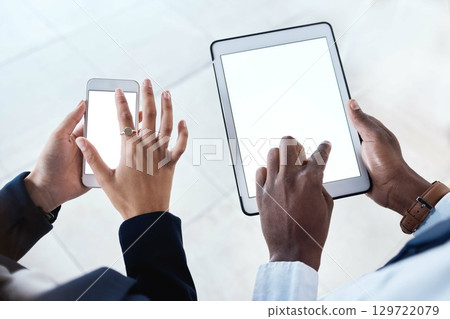 Business people, hands and tablet with screen on mockup above in corporate networking, advertising or marketing. Hand of employee team on touchscreen or phone display for digital advertisement or app Business people, hands and tablet with screen on mockup above in corporate networking, advertising or marketing. Hand of employee team on touchscreen or phone display for digital advertisement or app 129722079