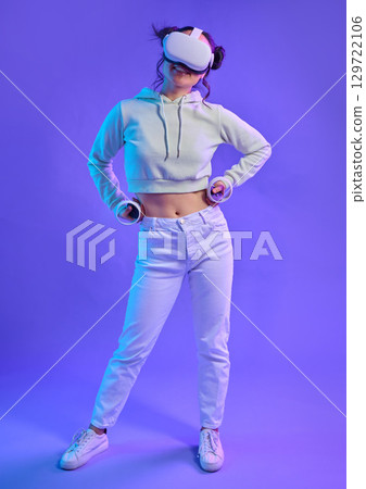 Woman, metaverse and virtual reality headset with mockup for futuristic gaming, cyber and 3d world. Gamer person with hand for ar, digital experience and creative cyberpunk purple background app 129722106