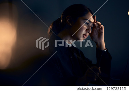 Burnout, stress and business woman at night working on computer for project, report and strategy deadline. Thinking, mental health and female worker in dark office frustrated, tired and overworked Burnout, stress and business woman at night working on computer for project, report and strategy deadline. Thinking, mental health and female worker in dark office frustrated, tired and overworked 129722135