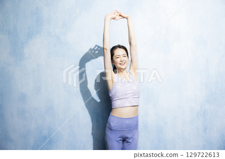 Women stretching Women stretching 129722613