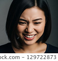 A woman with a laughing face 129722873
