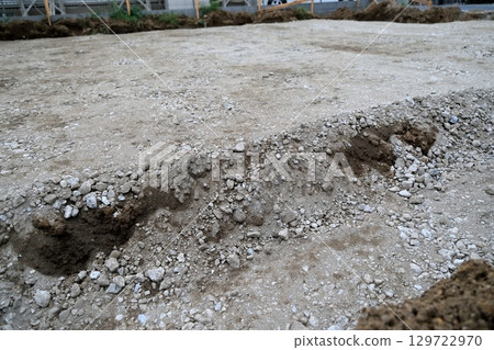 Foundation work for a house (laying the floor before pouring concrete) 129722970