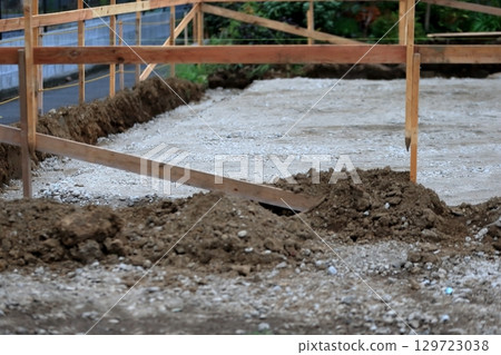 Foundation work for a house (laying the floor before pouring concrete) 129723038