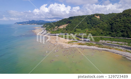 Shiroyone Senmaida rice fields and the uplifted coastline. Shiroyone Senmaida rice fields undergoing restoration following damage caused by the 2024 Noto Peninsula earthquake and heavy rains. Aerial view. 129723489