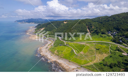 Shiroyone Senmaida rice fields and the uplifted coastline. Shiroyone Senmaida rice fields undergoing restoration following damage caused by the 2024 Noto Peninsula earthquake and heavy rains. Aerial view. Shiroyone Senmaida rice fields and the uplifted coastline. Shiroyone Senmaida rice fields undergoing restoration following damage caused by the 2024 Noto Peninsula earthquake and heavy rains. Aerial view. 129723493