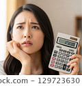 A woman struggling financially 129723630