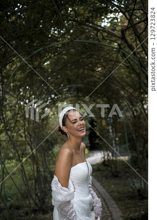 A woman wearing a dress 129723824