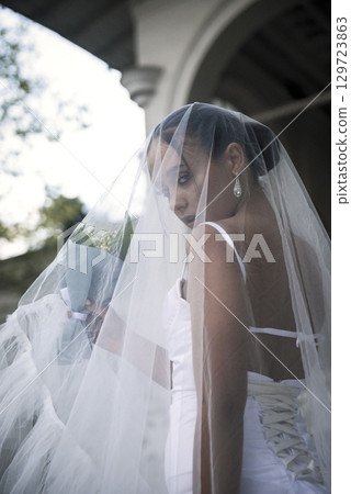 beautiful bride covered with veil. beautiful bride covered with veil. 129723863
