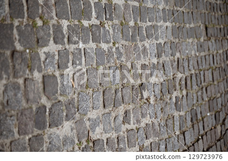 paving stones gray stone close-up 129723976