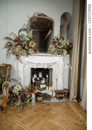 A living room filled with furniture and a fire place A living room filled with furniture and a fire place 129723998