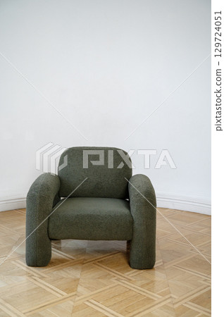 A chair sitting in a room A chair sitting in a room 129724051
