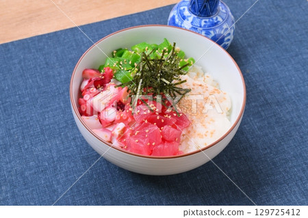 A sticky and creamy summer seafood bowl, summer dish, okra, grated yam, tuna, and octopus. A sticky and creamy summer seafood bowl, summer dish, okra, grated yam, tuna, and octopus. 129725412