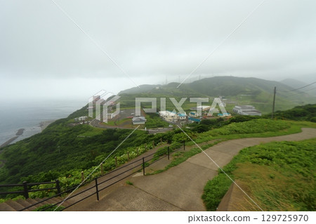 Misty Tsugaru Peninsula, view to the south from the top of the Stair Village Road at Cape Tappi (Sotogahama Town, Aomori Prefecture) Misty Tsugaru Peninsula, view to the south from the top of the Stair Village Road at Cape Tappi (Sotogahama Town, Aomori Prefecture) 129725970
