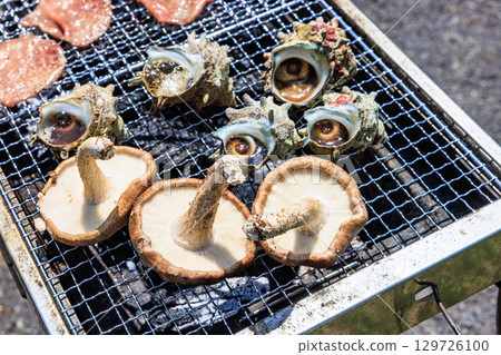 Food grilled on a barbecue grill Food grilled on a barbecue grill 129726100