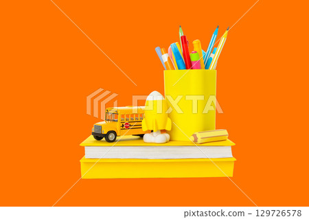 Yellow-themed school supplies ready for the semester Yellow-themed school supplies ready for the semester 129726578