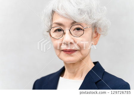 Senior woman in a business suit Business image Senior woman in a business suit Business image 129726785