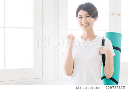 Young woman doing yoga, healthy image 129726815