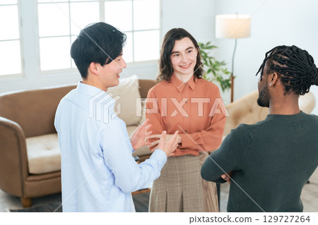 Multinational people standing and talking 129727264