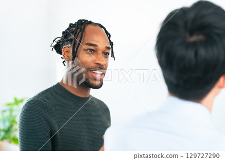Foreign men talking 129727290