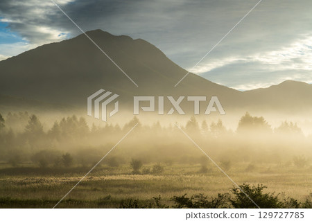 Morning mist and clouds rising from Odashirogahara in Oku-Nikko in summer 129727785