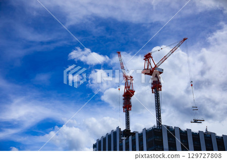 Crane at a construction site in front of Shinjuku Station, Tokyo [Development image] 129727808
