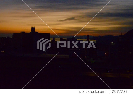 Sunset and Silhouette (West Exit of Beppu Station/Ekimaecho, Beppu City, Oita Prefecture) Sunset and Silhouette (West Exit of Beppu Station/Ekimaecho, Beppu City, Oita Prefecture) 129727831