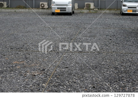 Image of parking lot with crushed stone 129727878