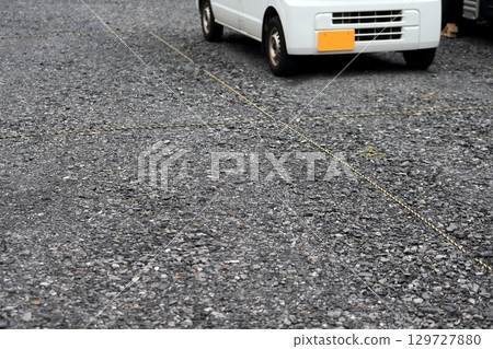 Image of parking lot with crushed stone 129727880