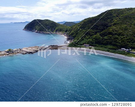 Aerial view of Senjojiki and the sea on Naru Island in the Goto Islands, Nagasaki Prefecture, taken with a drone 129728091
