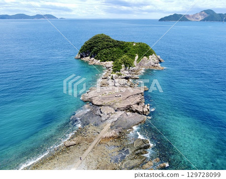 Aerial view of Senjojiki and the sea on Naru Island in the Goto Islands, Nagasaki Prefecture, taken with a drone 129728099