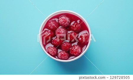 Raspberry fruit jam on paper basket container delivery take away, flat lay copy space Raspberry fruit jam on paper basket container delivery take away, flat lay copy space 129728505