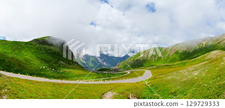Scenic Alpine Road through Grossglockner, Austria A Breathtaking Mountain Pass Panorama Scenic Alpine Road through Grossglockner, Austria A Breathtaking Mountain Pass Panorama 129729333