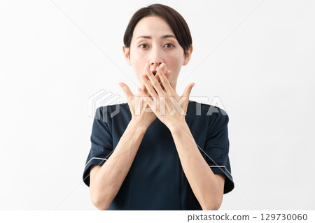 Young woman wearing beauty salon uniform Beauty image Young woman wearing beauty salon uniform Beauty image 129730060