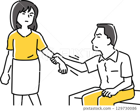 A man holding a woman's hand to stop her A man holding a woman's hand to stop her 129730086