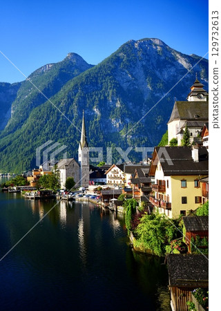 Beautiful lakeside townscape and Alpine scenery of Hallstatt, Austria, a World Heritage Site Beautiful lakeside townscape and Alpine scenery of Hallstatt, Austria, a World Heritage Site 129732613