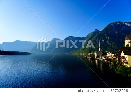 Beautiful lakeside townscape and Alpine scenery of Hallstatt, Austria, a World Heritage Site Beautiful lakeside townscape and Alpine scenery of Hallstatt, Austria, a World Heritage Site 129732908