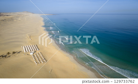 Panorama from above of luxury resort and Chaves beach with turquoise ocean 129733762