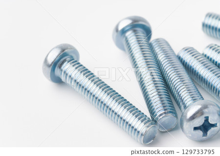 Close-up of a pan head screw (cross recess) 129733795
