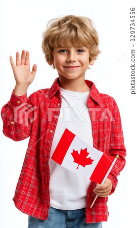 Smiling caucasian child waving canadian flag in red plaid shirt on white background. 129734556